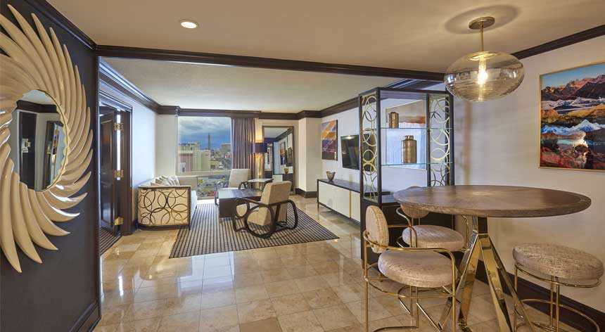 Photograph of the interior of a luxury Suite room at Treasure Island.